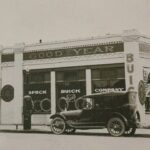 Historic Speck Buick Company dealership with vintage cars parked outside
